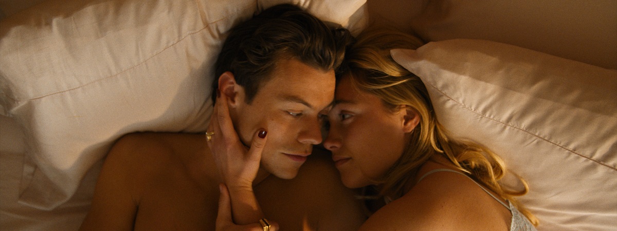 Harry Styles and Florence Pugh lie in a bed in Don't Worry Darling