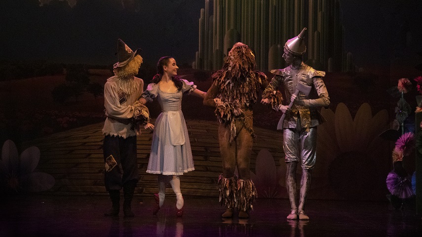 The scarecrow, Dorothy, lion and tin man in Ballet Theatre UK's The Wizard of Oz