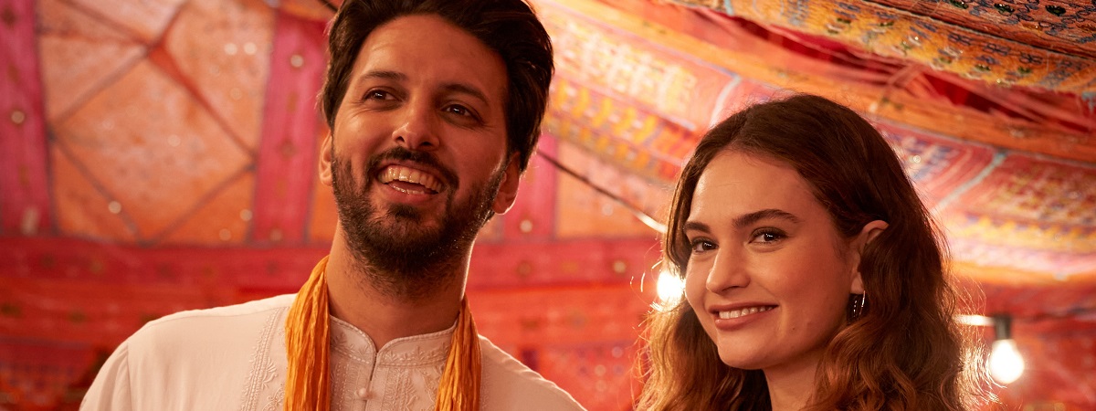Shazad Latif and Lily James in What's Love Got to Do with It? 