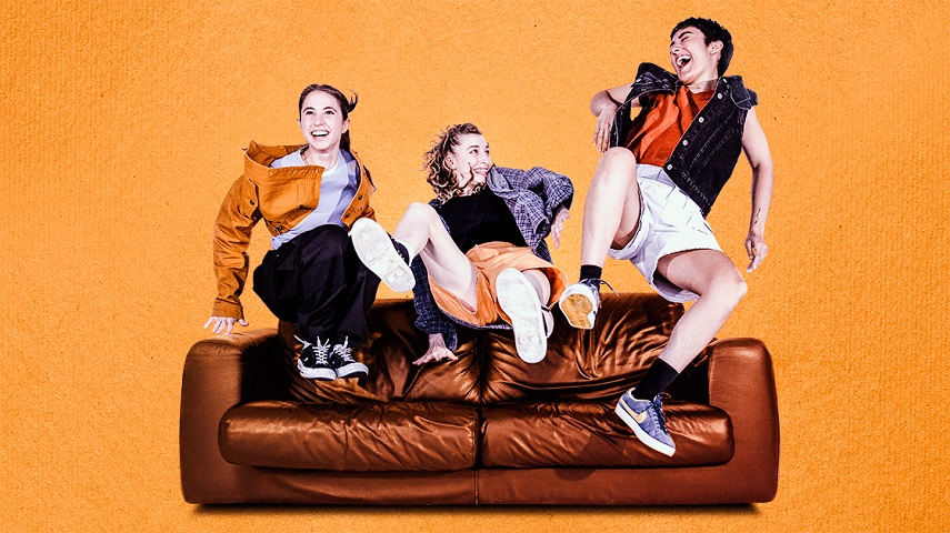 Three people are mid-jump as they are about to land on a couch in a promotional image for Donuts.