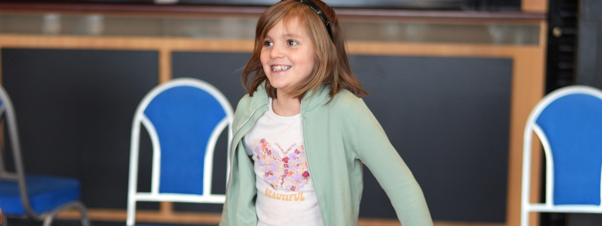 A young performer in a photograph from Gala Youth Theatre,